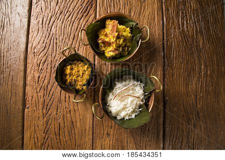Rice With Coconut, Yellow Flour And  Dried Meat With Rice In An Old Copper Pot - Traditional Bahia F