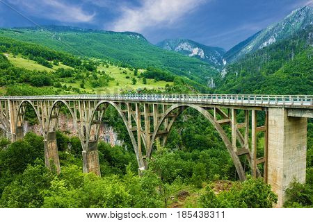 Mountain landscape Montenegro. Durdevica Tara arc bridge in the mountains One of the highest automobile bridges in Europe.