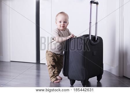 Cute Baby Boy Ready For A Crusie. Smiling Infant Kid Going To A Trip