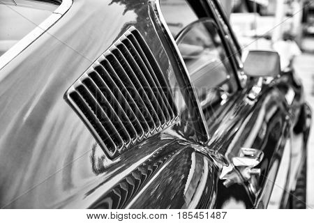 BERLIN - MAY 11: The ventilation grille of the Audi 100 (C1) Coupe S close-up (black and white) 26th Oldtimer-Tage Berlin-Brandenburg May 11 2013 Berlin Germany