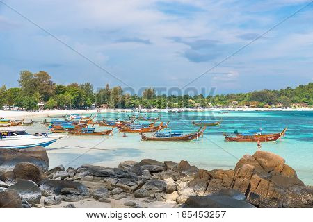 Holiday in Thailand - Beautiful Island of Koh Lipe with long tail boat by the beach at Satun Thailand.
