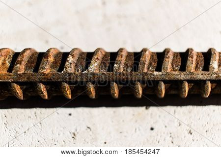 Close-up of a rusty steel reinforcement bar.