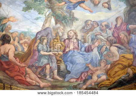 ROME, ITALY - SEPTEMBER 03: The fresco of The Miracle of Multiplication on the main apse of Basilica di Sant Andrea delle Fratte, Rome, Italy on September 03, 2016.