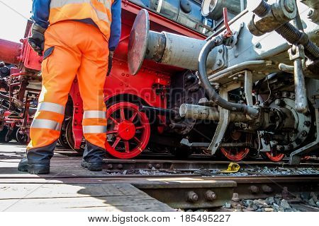 Railway worker in action at railway station