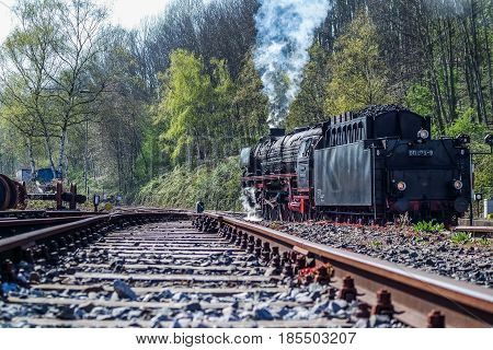 BOCHUM , GERMANY - APRIL 18 2015 : Steam train passing the station in Bochum-Dahlhausen