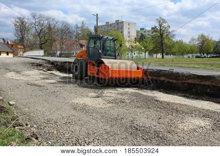 Closure road - reconstruction and roadroller/ Reconstruction old road in town.
