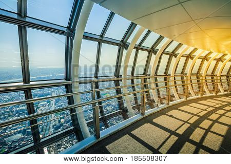 Tokyo, Japan - April 19, 2017: The spiral ramp of Tembo Gallery observation deck, the highest skywalk in the world. Tokyo Sky Tree is a telecommunications and panoramic tower in Sumida, Tokyo.