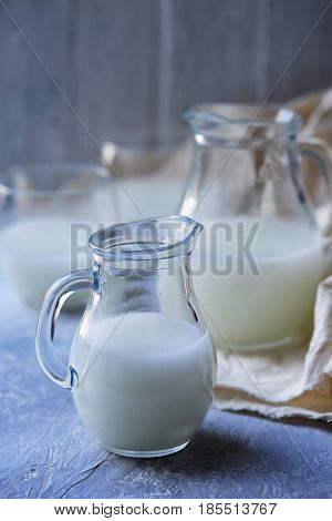 Jugs with serum. Healing product in rustic style