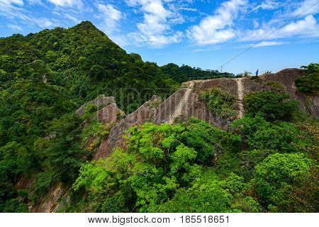 Wild mountainous landscape and tropical jungle along the Wu Liao Jian hiking trail in Taiwan