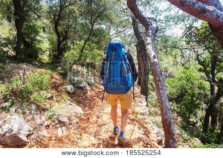 Hiking in famous Lycian Way in the Turkey. Backpacker in the trail.