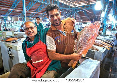 Bandar Abbas Hormozgan Province Iran - 16 april 2017: Two persian merchant at the fish market.