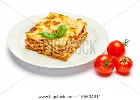Portion of tasty lasagn, isolated on white background