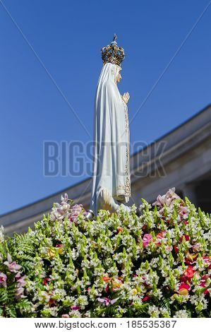 The Statue of the Virgin Mary at the Sanctuary of Fatima during the celebrations of the apparition of the Virgin Mary in Fatima Portugal.