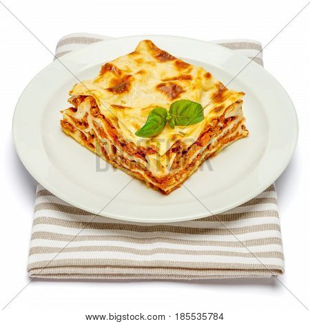 Portion of tasty lasagn, isolated on white background