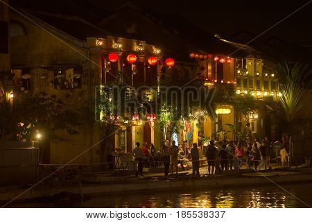 HOYAN, VIETNAM - JANUARY 02, 2016: Late evening on the old embankment of the Thu Bon river