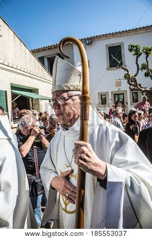Saint-Marie-de-la-Mer, Provence, France - May 25, 2015. World Festival of Gypsies. The religious procession in honor of the Holy Mary and St. Sara begins. Participants and guests of the city