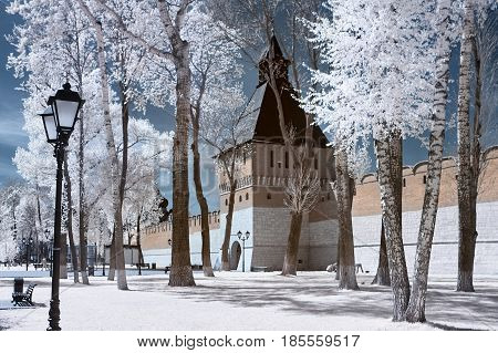 The landscape is shot on a specially installed camera on which a filter is installed that does not allow the visible range of light to be visible. But only infrared radiation. With this shooting the grass and foliage of the trees in white pink or red colo