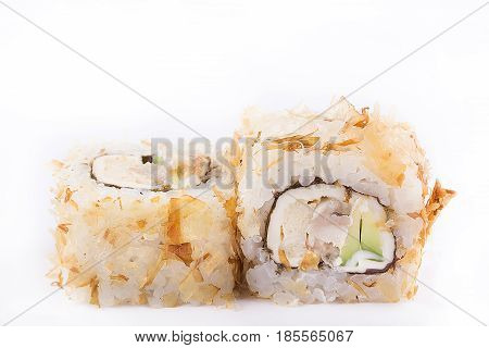 Japanese Cuisine, Sushi Set: Roll With Shavings Of Tuna, Eel, Melted Cheese, Avocado On A White Back