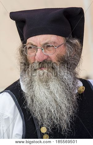 CAGLIARI, ITALY - MAY 1, 2017: 361 Religious procession of Sant'Efisio - portrait of a man in traditional Sardinian costume - Sardinia