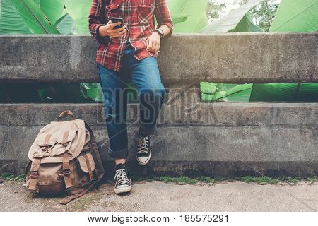 Front Portrait Of A Young Man Traveler He Is Using Mobile Phone Travel Concept