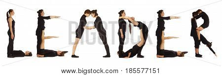 Black dressed people forming word LEADER on white background