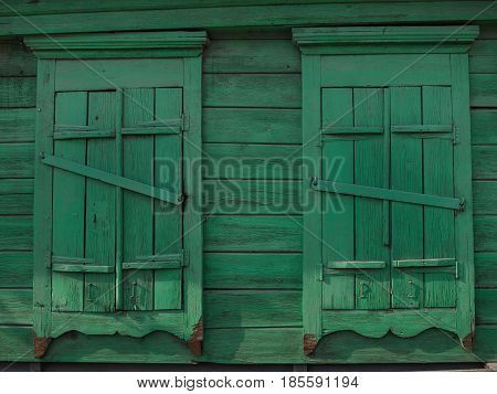Background of old wooden shutters of green color