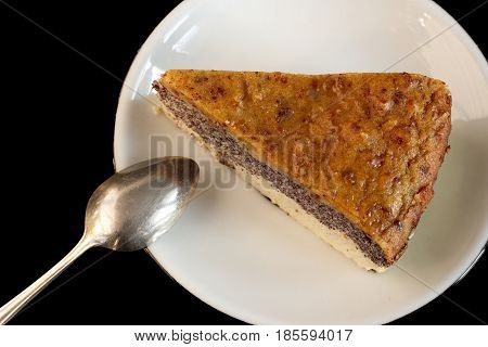 Photo of homemade poppy seed cake made from paleo and vegetarian friendly ingredients. Healthy snack without added sugar gluten and milk.