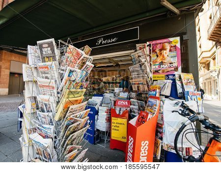 PARIS FRANCE - MAY 9 2017: INternational press newspapers front pages with the picture of the newly elected French president Emmanuel Macron after the second round French Presidential election