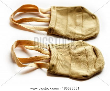Rhythmic gymnastics shoes worn on white background.