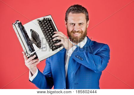 Vintage Business Man In Blue Suit And Tie With Typewriter