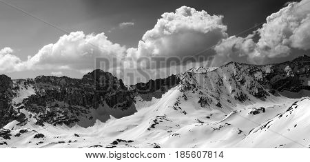 Black And White Panorama Of Snowy Mountains In Sun Day