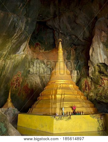 Majestic golden paya in sacred Yathaypyan Cave Hpa-An Myanmar.