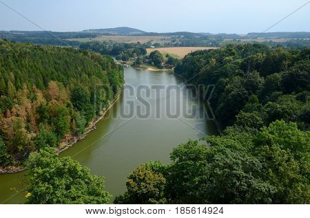 Landscape with a river flowing through the forest Kwisa in Poland