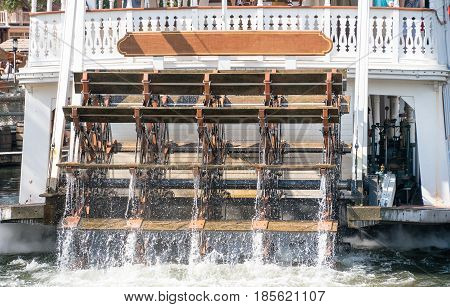 Steamboat paddles on the rear of steamer