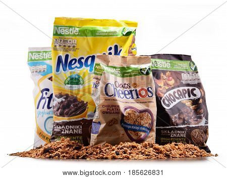 Four Packages Of Nestle Breakfast Cereals Isolated On White