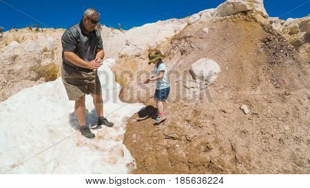  Little girl on a weekend hike with her dad in Paint Mines Interpretive Park in Colorado.