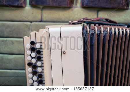 Close-up of old Russian traditional musical instrument bayan