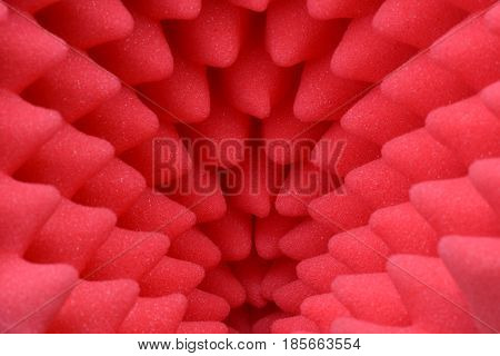 Red foam acoustic, safe packaging material as background