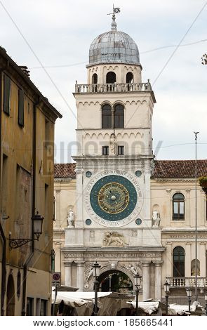 Clock tower building of medieval origins overlooking Piazza dei Signori in Padova Italy