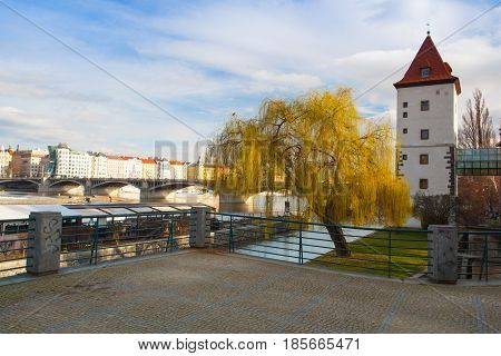 Prague Czech Republic - March 3 2017: View on the Prague panorama with Jirasek bridge after rain.The Prague bridges arching over the Vltava River are not only vital connecting links but also valuable works of architecture .