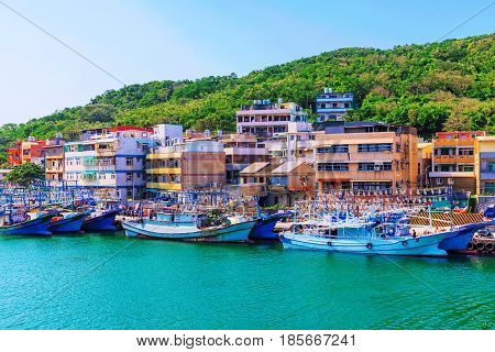 Fishing town in Taiwan with boats on a sunny day