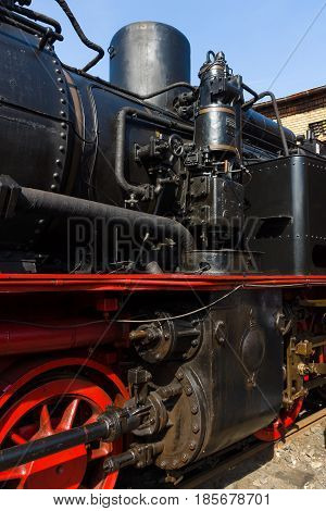 BERLIN - APRIL 21: Detail of an old steam locomotive Spring Festival Exhibition in the Rail yard Schoeneweide April 21 2013 in Berlin Germany