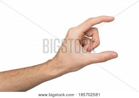 Male hand measuring invisible items, man's palm making gesture while showing small amount of something on white isolated background, side view, close-up, cutout, copy space