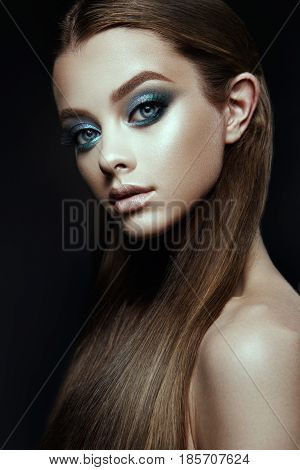 Fashion model Woman with fantasy make up. Long blowing brown hair. Fantasy Girl. Mermaid.