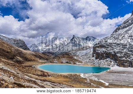 Green scared milk lake also called niunai lake at a high altitude in Yading Daocheng Si Chuan Province.