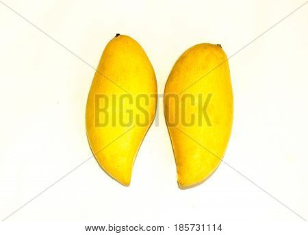 Yellow Mangoes On A White Background.  Space For Text