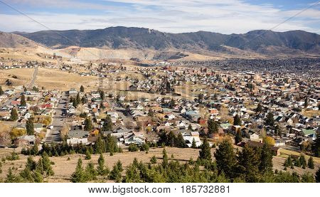 The hillside home and downtown of Butte Montana with winter setting in
