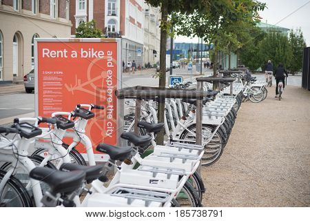 COPENHAGEN DENMARK - JULY 31 2016: Row of white rental Go-bikes which can be hired per hour