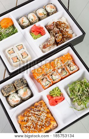 Bento lunch boxes served on wooden table