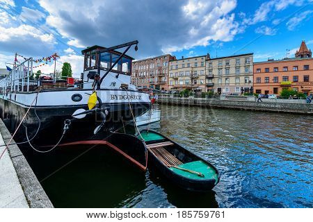Bydgoszcz, Poland - May 8, 2016; Old Town And Tourist Boat - Cruise Ship On Brda River